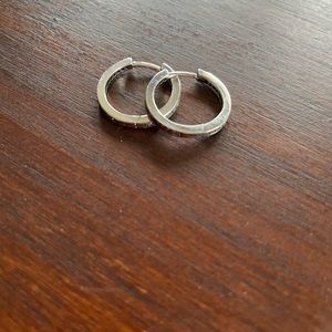 Brand new sterling silver hoop earrings with delicate crystals